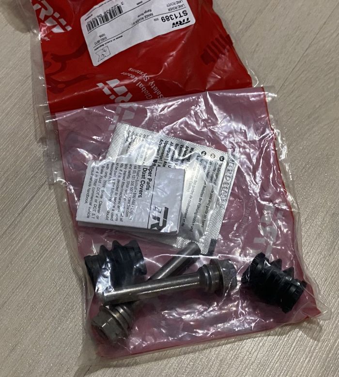 Ремкомплект супорта гальмівного, заднього - TRW - ST1389